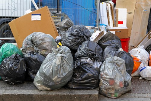 Professional house clearance team in Archway removing furniture